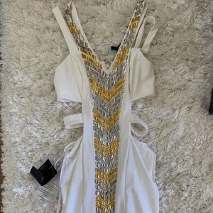 Stunning gold and white cut out dress